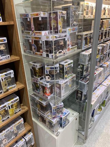 this is a sample photo of Detolf Display Glass cabinet where funkos displayed on a glass cabinet